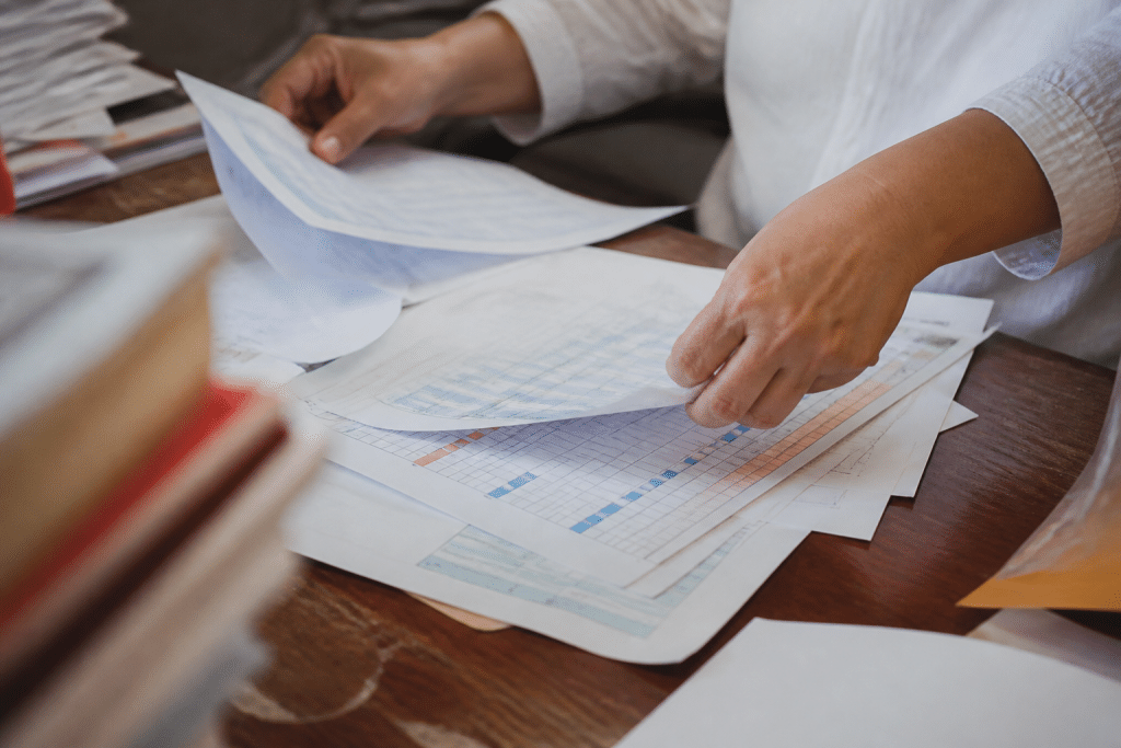 Documents administratifs avec tableaux de pourcentages et formulaires d'affiliation